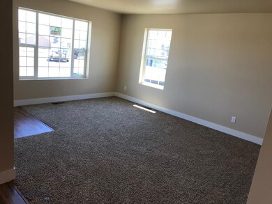 Living room. Photo of similar home.