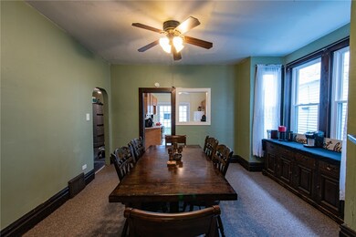 Dining room has large windows allowing abundant na