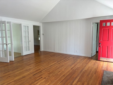 Main living room, vaulted ceilings throughout creates an airy, light filled atmosphere
