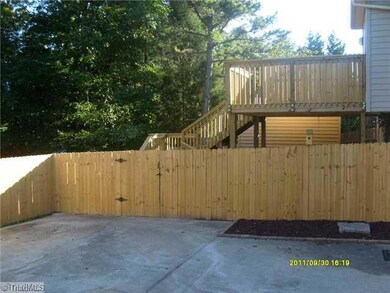 Patio/Deck. Custom deck with stairs leading to patio and back yard