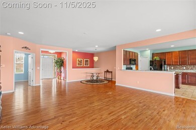 Unfurnished living room with light wood-type flooring and recessed lighting