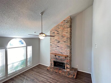 Living room with lofted ceiling