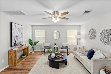 Living room featuring a wealth of natural light, 