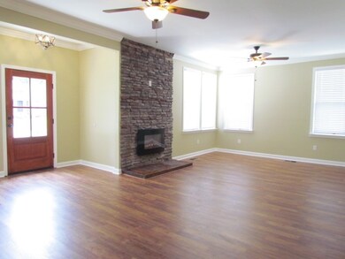 The foyer welcomes you into the open living and di