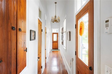 Walk down this stunning bright and airy hallway to