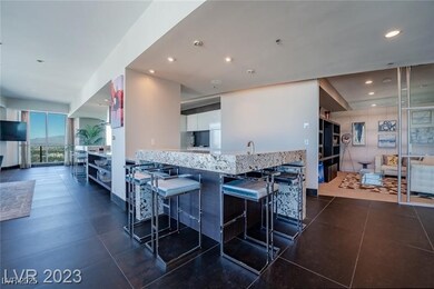 Kitchen with recessed lighting, a breakfast bar, a