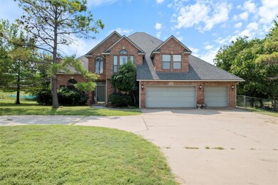 View of front of house featuring a garage and a fr