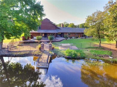 Absolutely stunning home with pond...ducks and fish included!