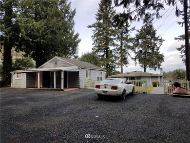 Parking lot is newly graveled. Each unit has 2 spaces and the storage space has 4 spaces.