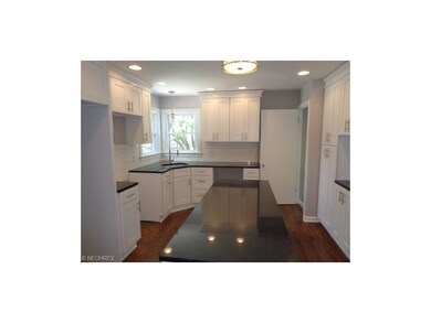 kitchen with hardwood floors, recessed lights and 