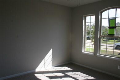 This is the front guest suite with light and bright window wall and private bath.