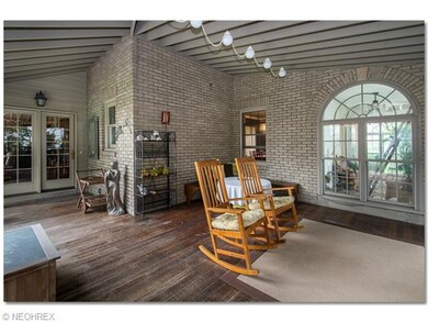 Large screened porch is great for entertaining, relaxing