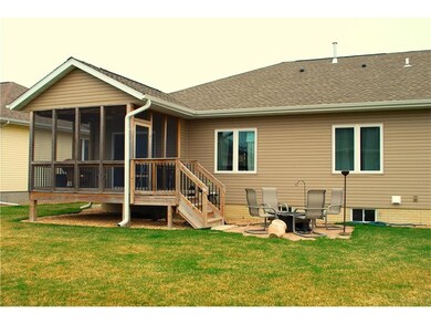 Screened deck with patio.