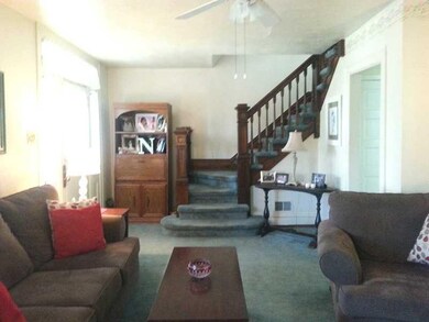 Living Room. Showing entry, lovely dark stained st