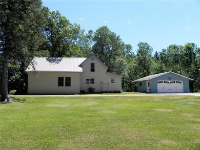 Exterior Side & 2-Car 24x24 Detached Garage