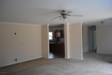 Great room view of dining & kitchen
