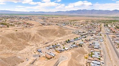View of property location featuring mountains, nea