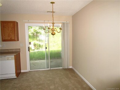Dining Area off Living Room and Kitchen leads to r