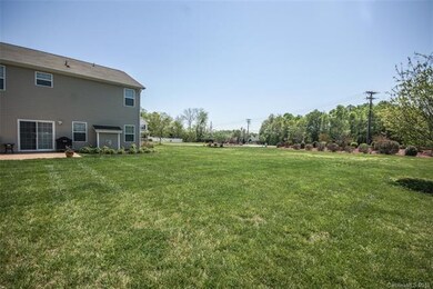 Huge rear yard with nearly 1/2 acre that extends t