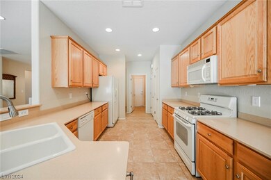 Kitchen leading to Laundry Room