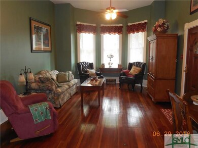 Living room looking towards bay window.