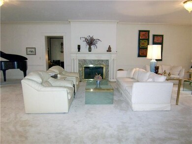 Great Room. Great Room measures with marble firepl