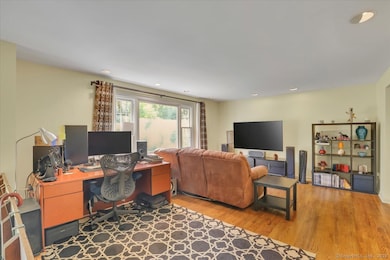 Large open floor plan featuring bright living room with HW floors