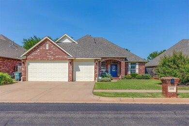 View of front of home featuring a 3 car garage and