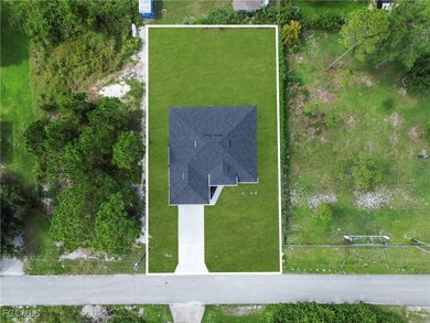 Aerial overview of property's location with property parcel outlined
