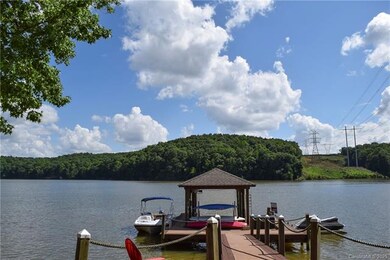 Covered dock with lift and jet ski port