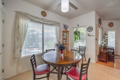 Dining room featuring light tile patterned floorin