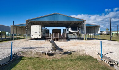 663 Blue Water Blvd, Sargent, TX 77414 - photo 2