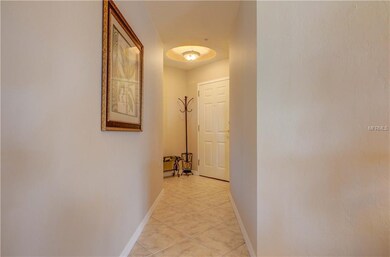 Front Door and Foyer with tile flooring