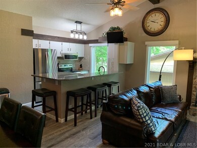 Great room features open floor plan, granite count
