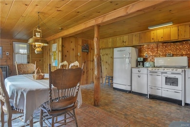 Vintage kitchen with heated brick floor - laundry 