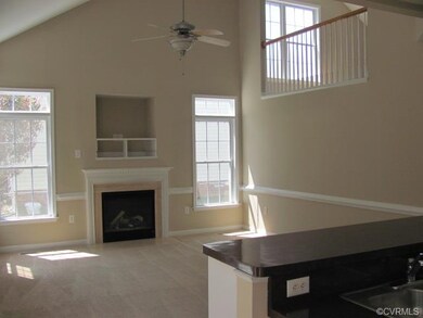 View of Great Room from Kitchen - Vaulted Ceiling
