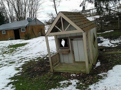 Outbuilding. 1 good size shed , and one cute small