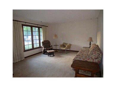 Living Room. Love the big front window-all the bet