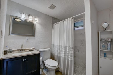 1371 Woodcrest Rd W unit B, West Palm Beach, FL 33417 - photo 2