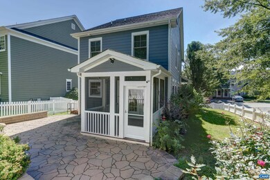 Fenced rear yard with large patio and screened porch.