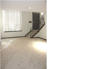 Spacious living room with large picture window and