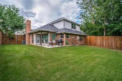 Spacious backyard with covered patio and room for 