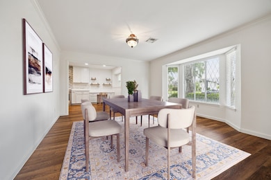Formal dining room, virtually staged.