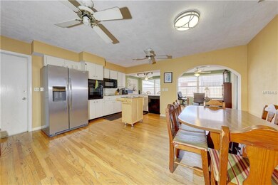 Open kitchen and dining overlook back room!