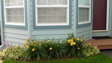 Landscaped with flower gardens