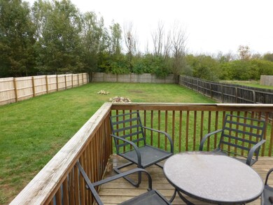 Deck fenced yard