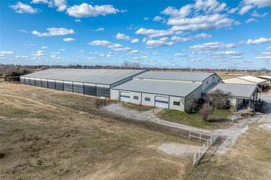Aerial of barn, office and arena