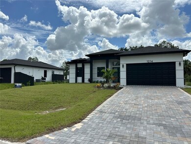 1214 Cherry St E, Lehigh Acres, FL 33974 - photo 2