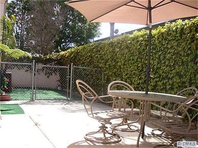 Private yard with high block walls