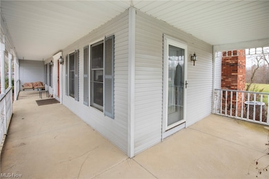 View of terrace with a porch